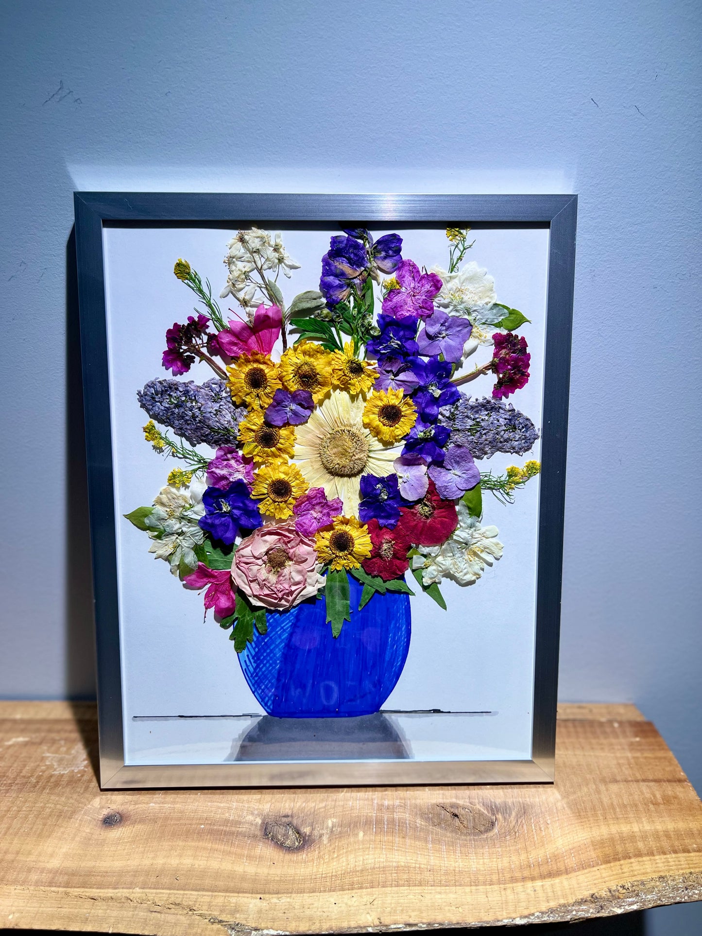 Blue vase reflection bouquet
